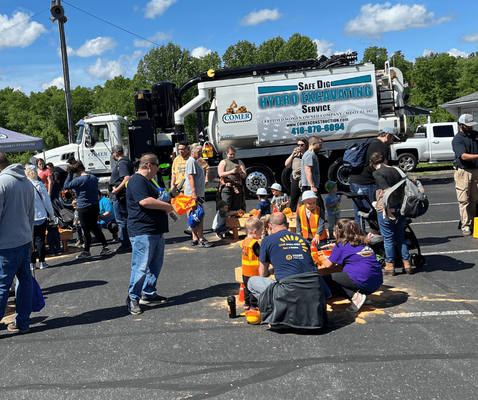 Crowd at the Touch A Truck event in front of the Comer truck