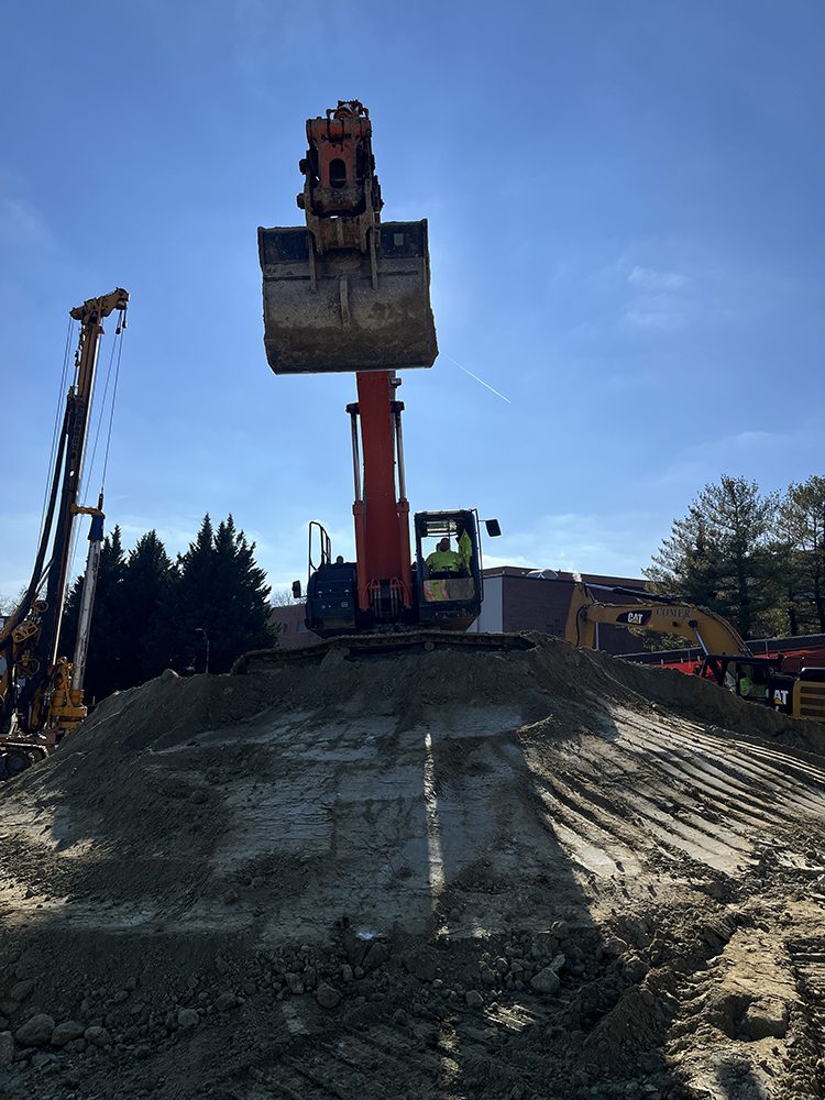 Excavator digging at the hospital construction site