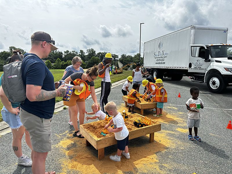 Crowd at the Highland School sandboxes at the touch a truck event