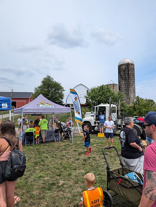 Crowd at Falling Branch Touch a Truck even outside Comer Contruction Tent<br />
