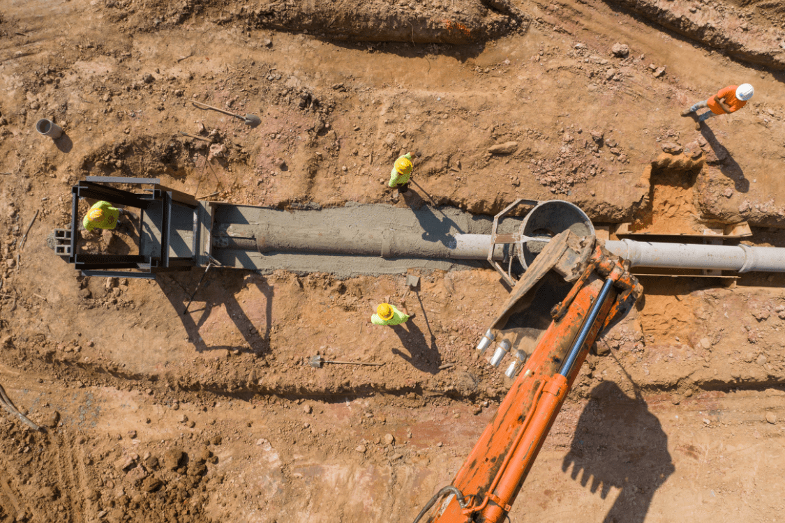 Comer Construction crews installing underground utilities