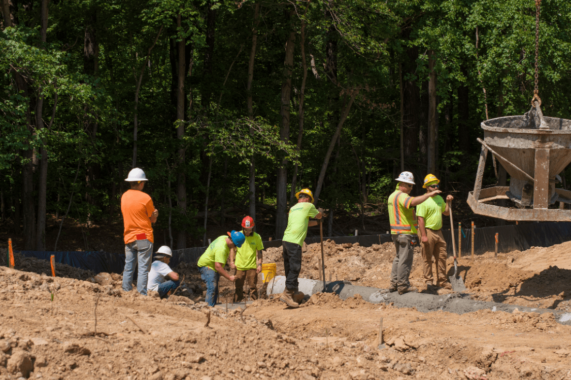 Crews working on underground utility installation