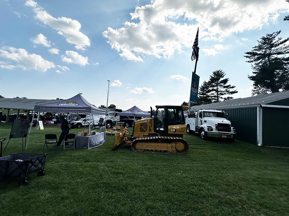 young boy playing at touch a truck